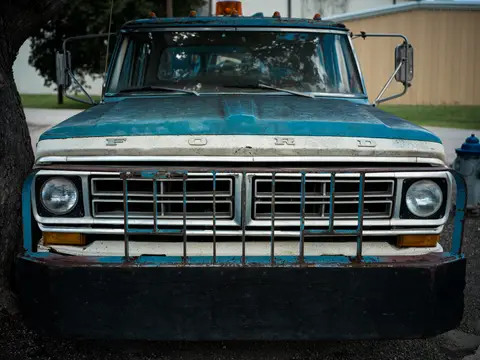 Ford one-ton, push bar and tree shade