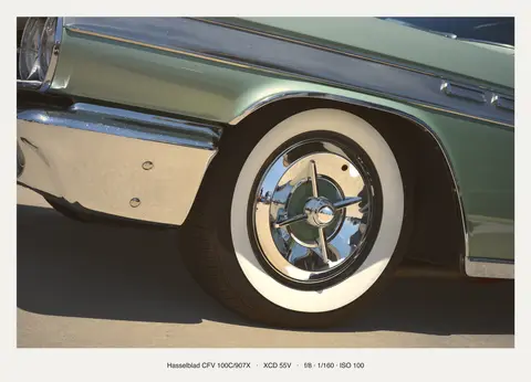 Chrome spinner and a fat whitewall