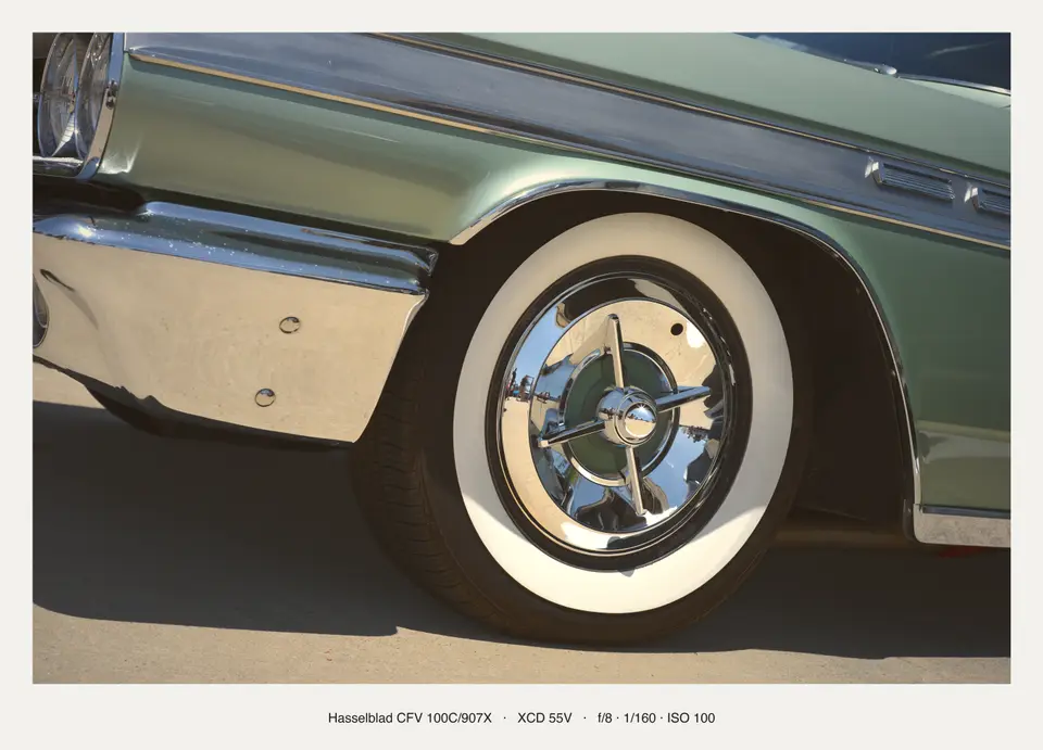 Chrome spinner and a fat whitewall