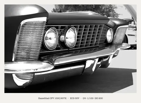 Grille, quad lamps and chrome