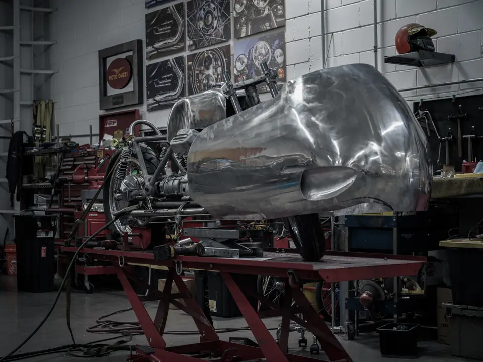 Hand-formed aluminium body on the lift