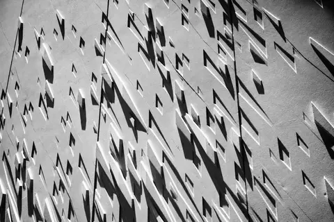 Angular facade, raking light