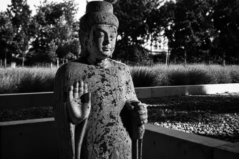 Standing figure in the garden